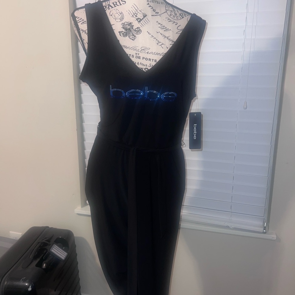 🎉5 for $10 NWT Bebe Black Jumpsuit with Sparkling Blue Detail size M